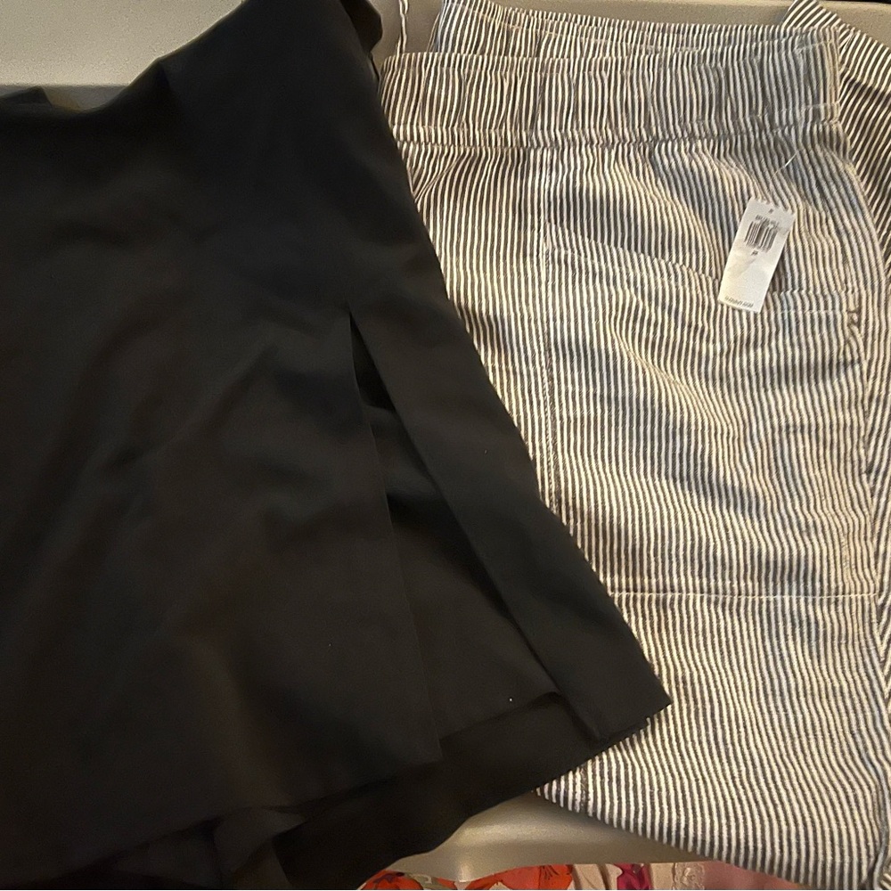 Black skort and Striped pants